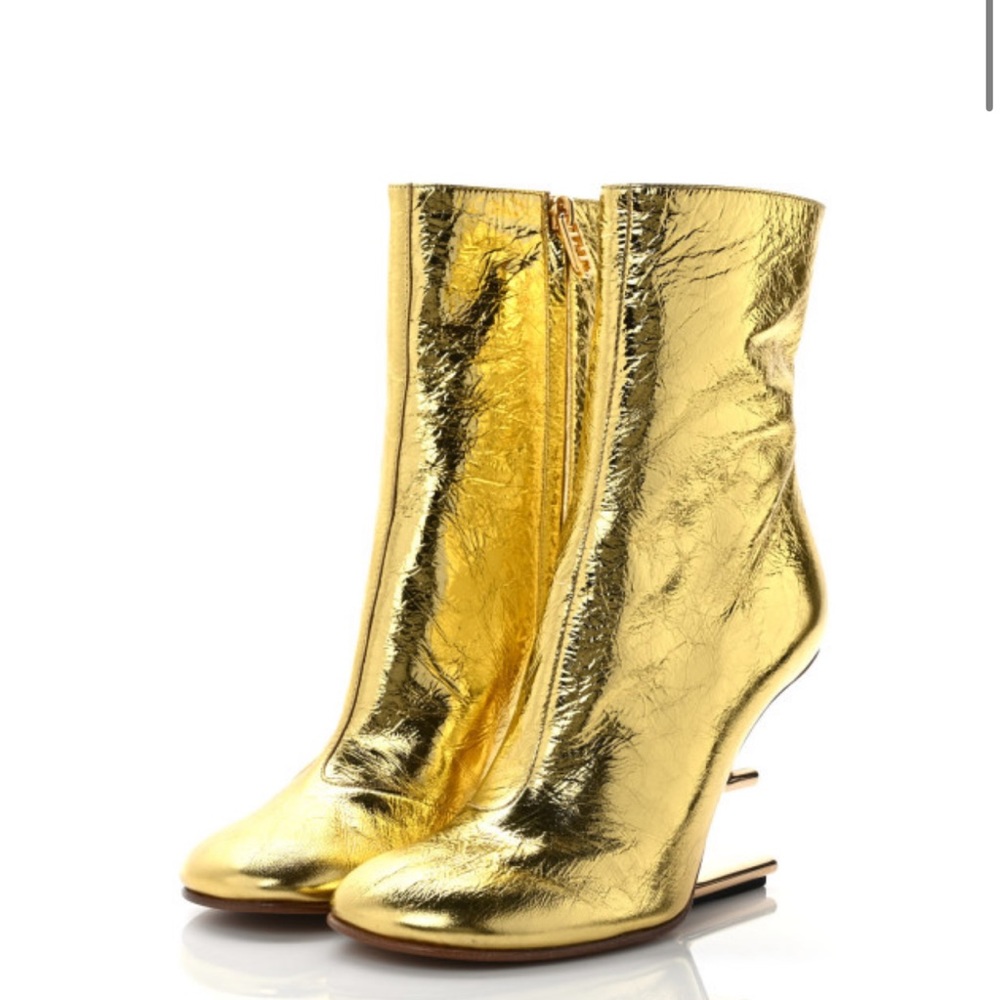 FENDI
Laminated Craquele Nappa Fendi First 95mm Booties Gold
